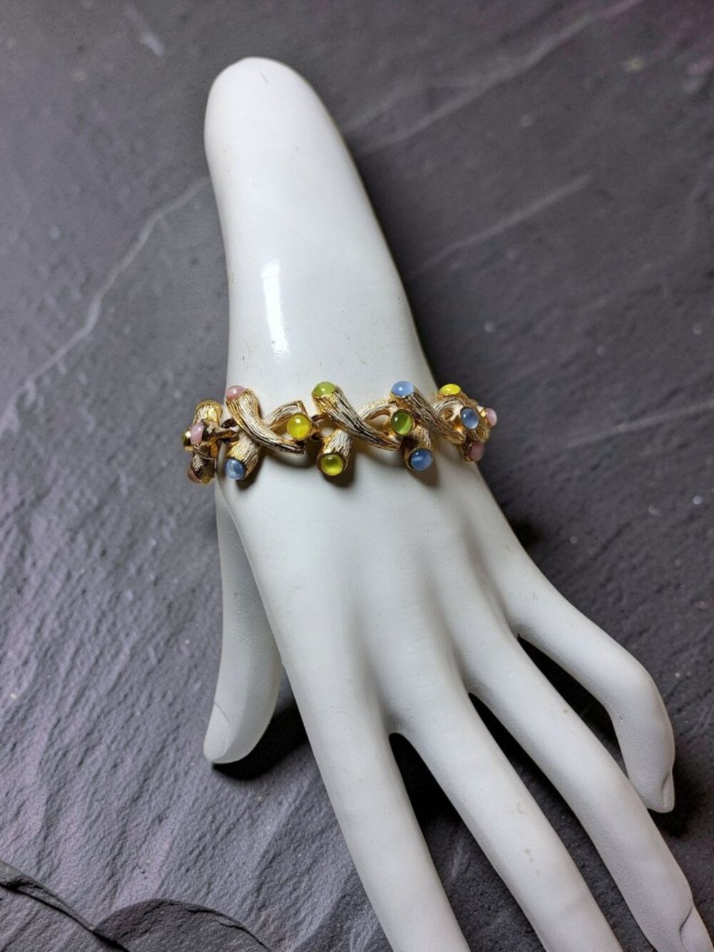 vintage Goldtone twig link bracelet with faux round gemstone .